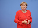 Германияда Меркельдің портреті бар алтын монеталар шығарылды