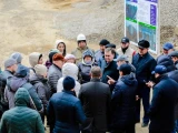 Астана әкімі құрылысы ұзаққа созылған үйлердің үлескерлерімен кездесті